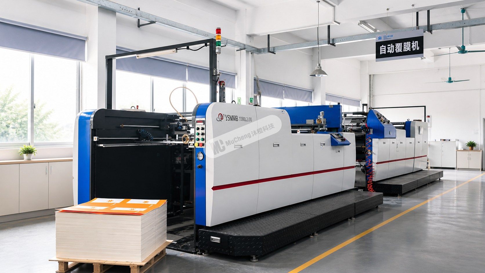 Automatic laminating machine on production floor