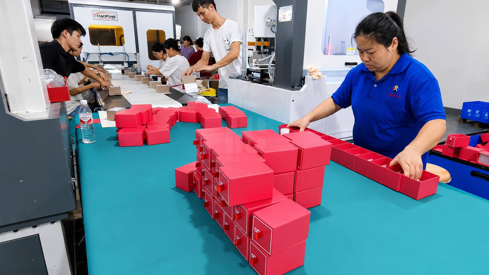 Sliding drawer box production line with custom inserts