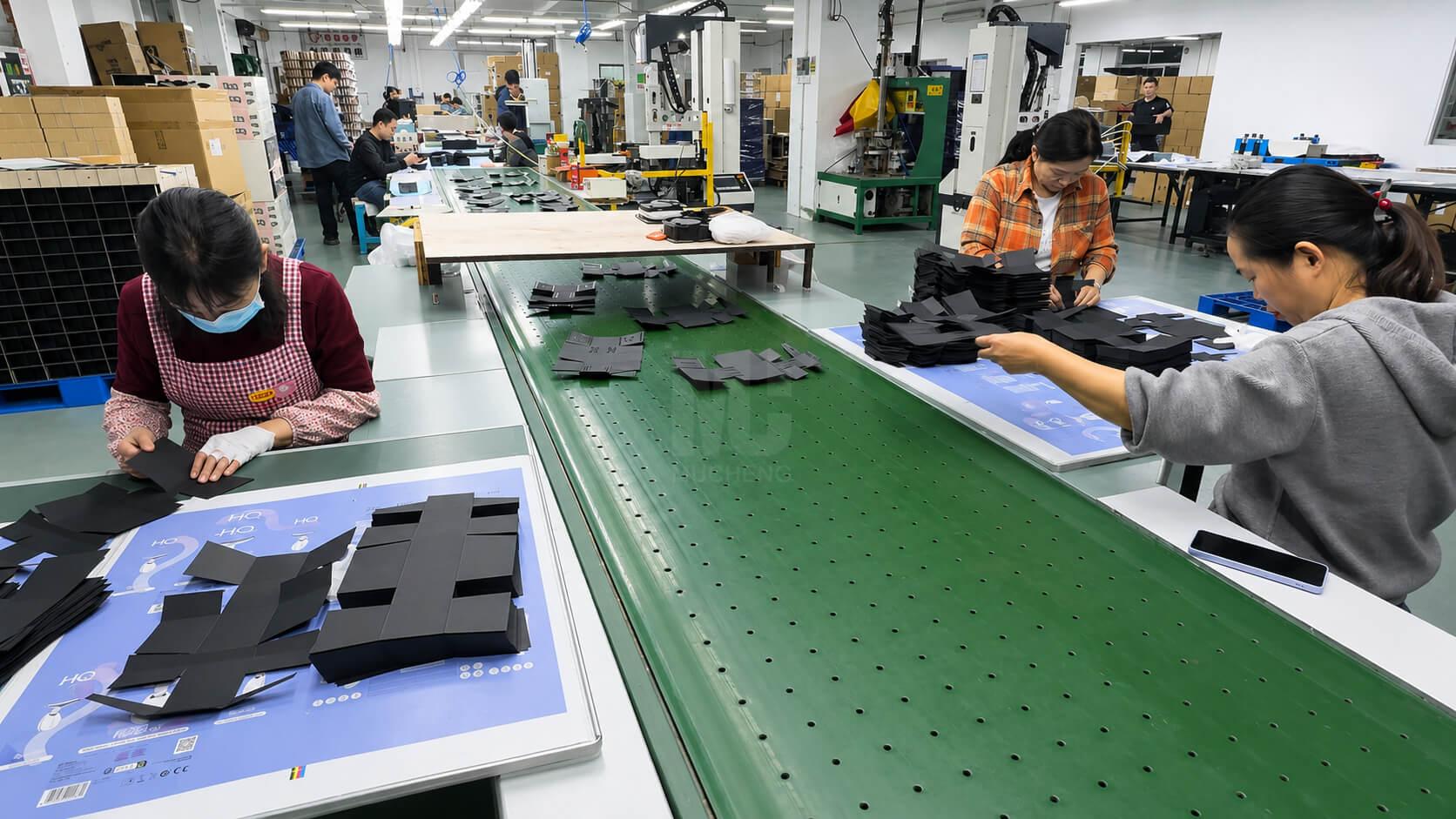 Custom EVA foam and paper tray insert assembly line